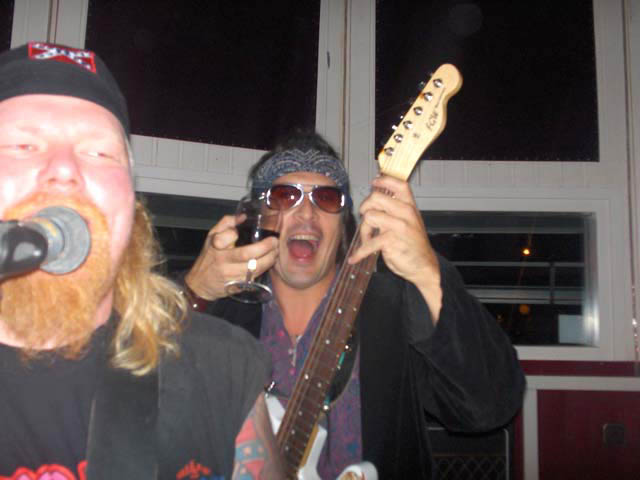 Rebel Vikings on Tour Pontus sings Dave plays slide with a wine glass